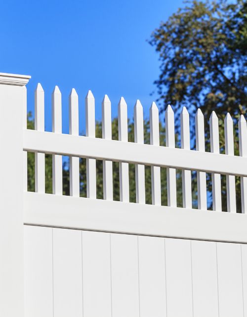 cropped view of a new white vinyl fence plymouth ma